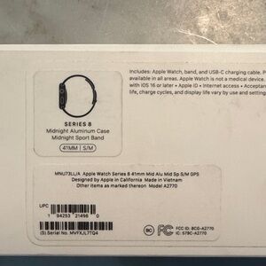 Apple White Smartwatch Charging Cable with midnight sport band